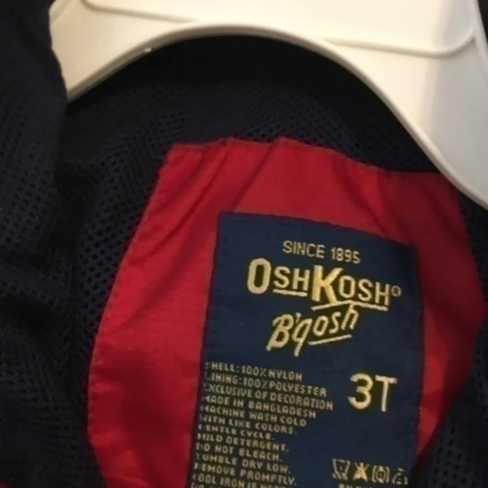 Boys size 3T Osh Kosh navy and red windbreaker